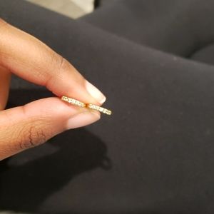 Gold and diamond huggies hoops.